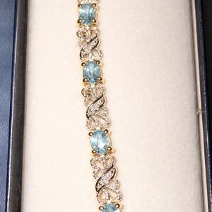 14k White Gold Blue Topaz tennis bracelet